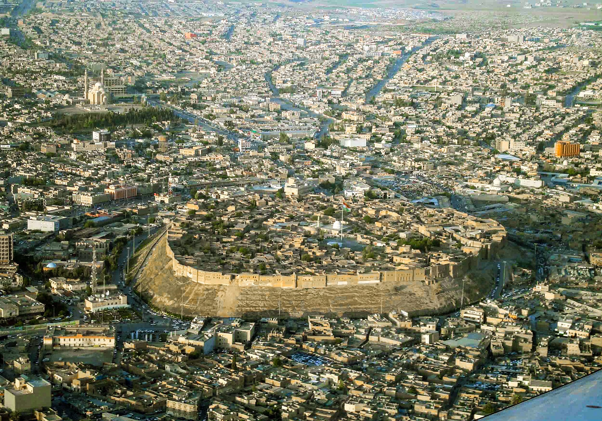 The Citadel of Erbil, rising on a great mound in the capital of Iraqi Kurdistan. Continuously inhabited for thousands of years, it is often described as one of the oldest living settlements on Earth.