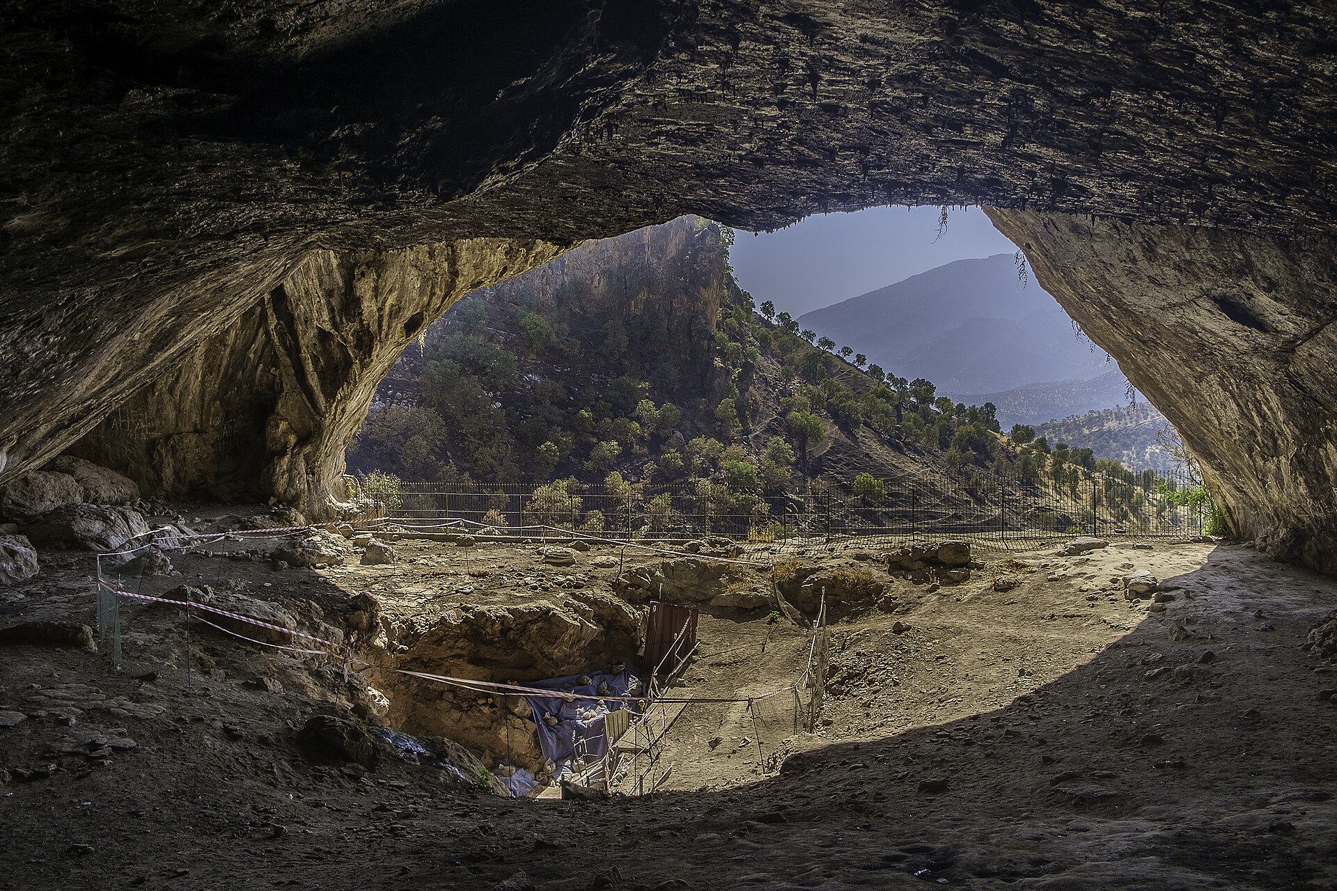 The Shanidar Cave in the Kurdish mountains of northern Iraq, where the remains of ten Neanderthals were found dating back some 35,000 to 65,000 years. The discoveries here reshaped ideas about how our ancient relatives lived and buried their dead.