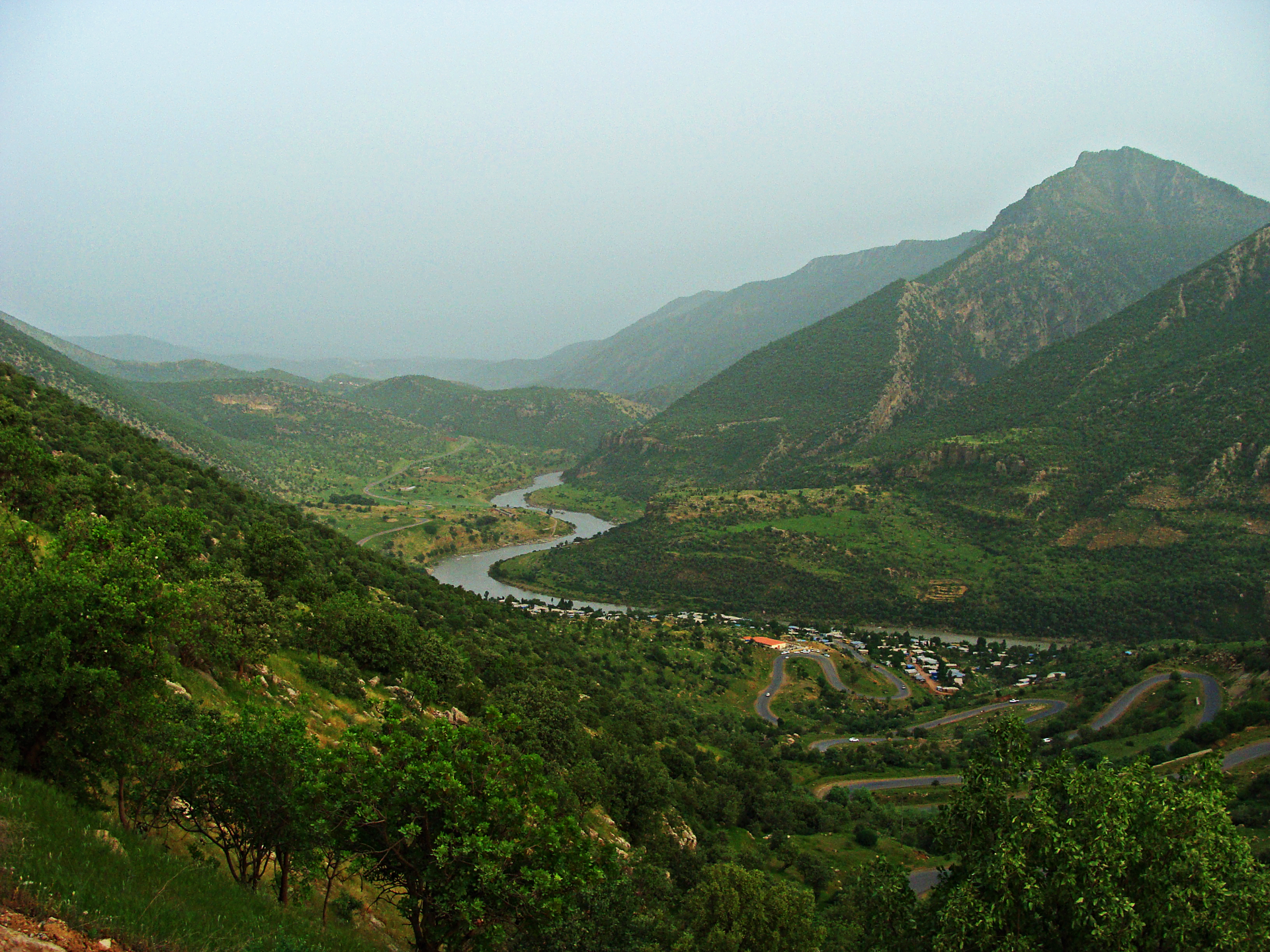 A green valley in the mountains of northern Iraq, where the Great Zab river flows down toward the Tigris. The Kurdish highlands are the wettest and coolest part of a country that is largely dry plain and desert.