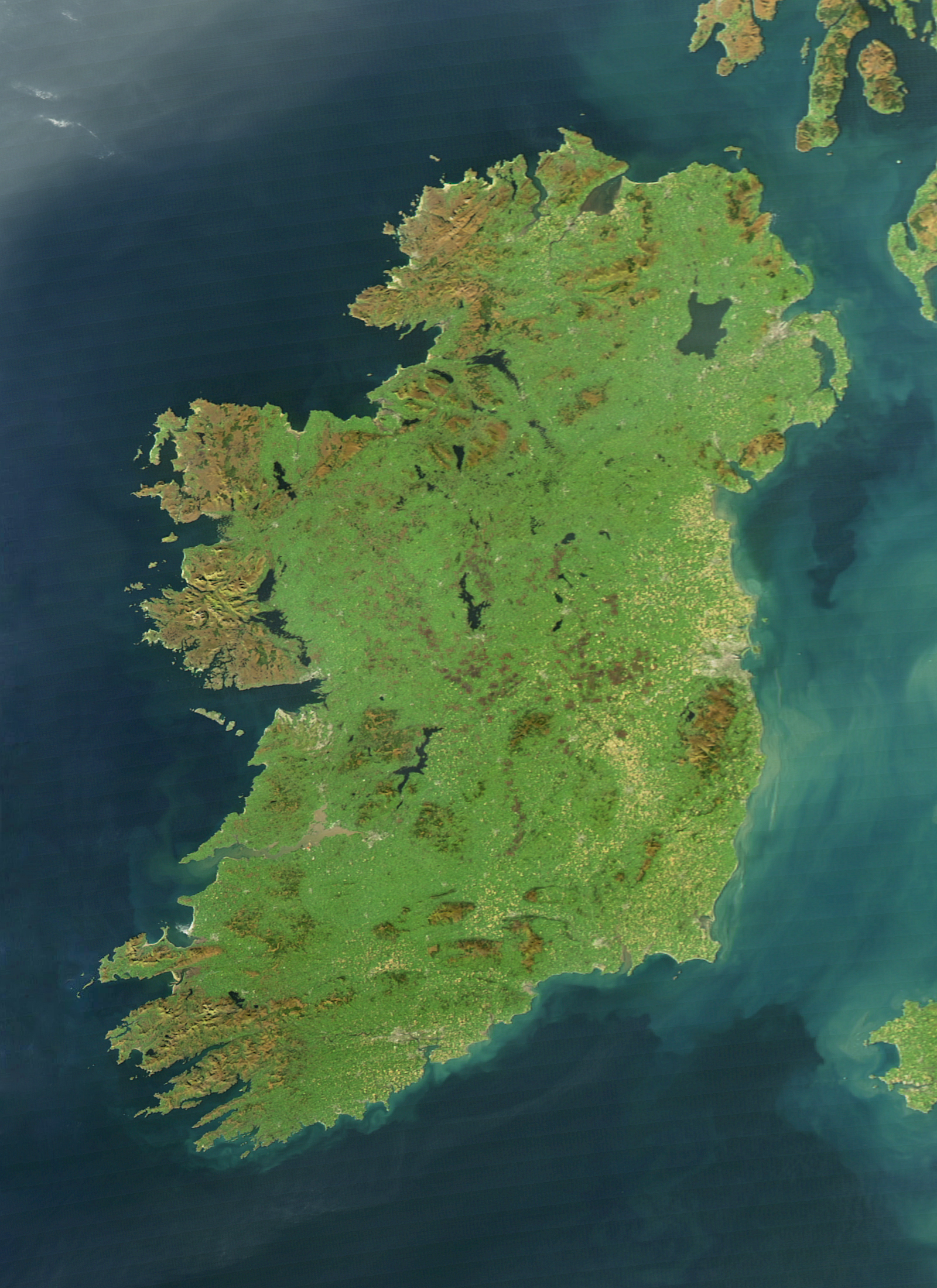 A satellite view of Ireland, whose green landscape gives it the name the Emerald Isle. Credit: Jeff Schmaltz (Public domain).