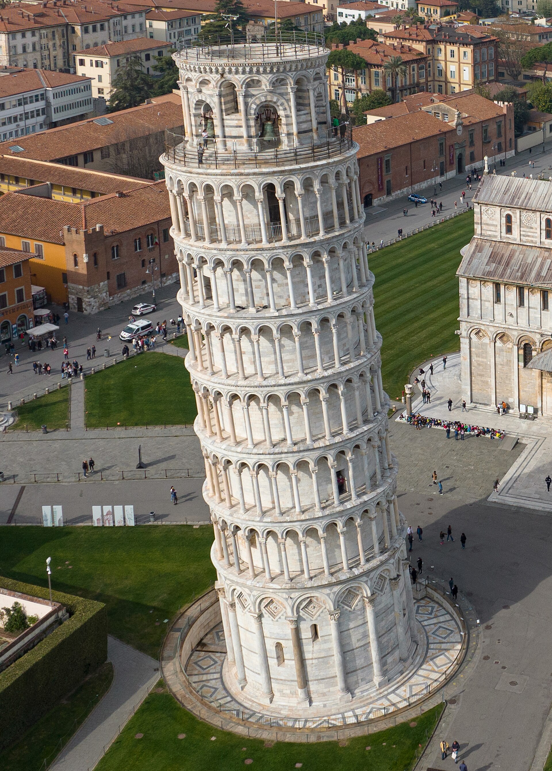 The leaning tower of Pisa, begun in 1173. The freestanding bell tower started to tilt during construction as its foundations settled, and its famous lean has drawn visitors ever since.