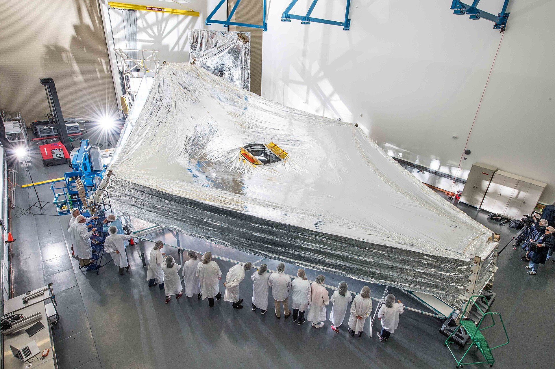 The telescope's giant sunshield being tested before launch.