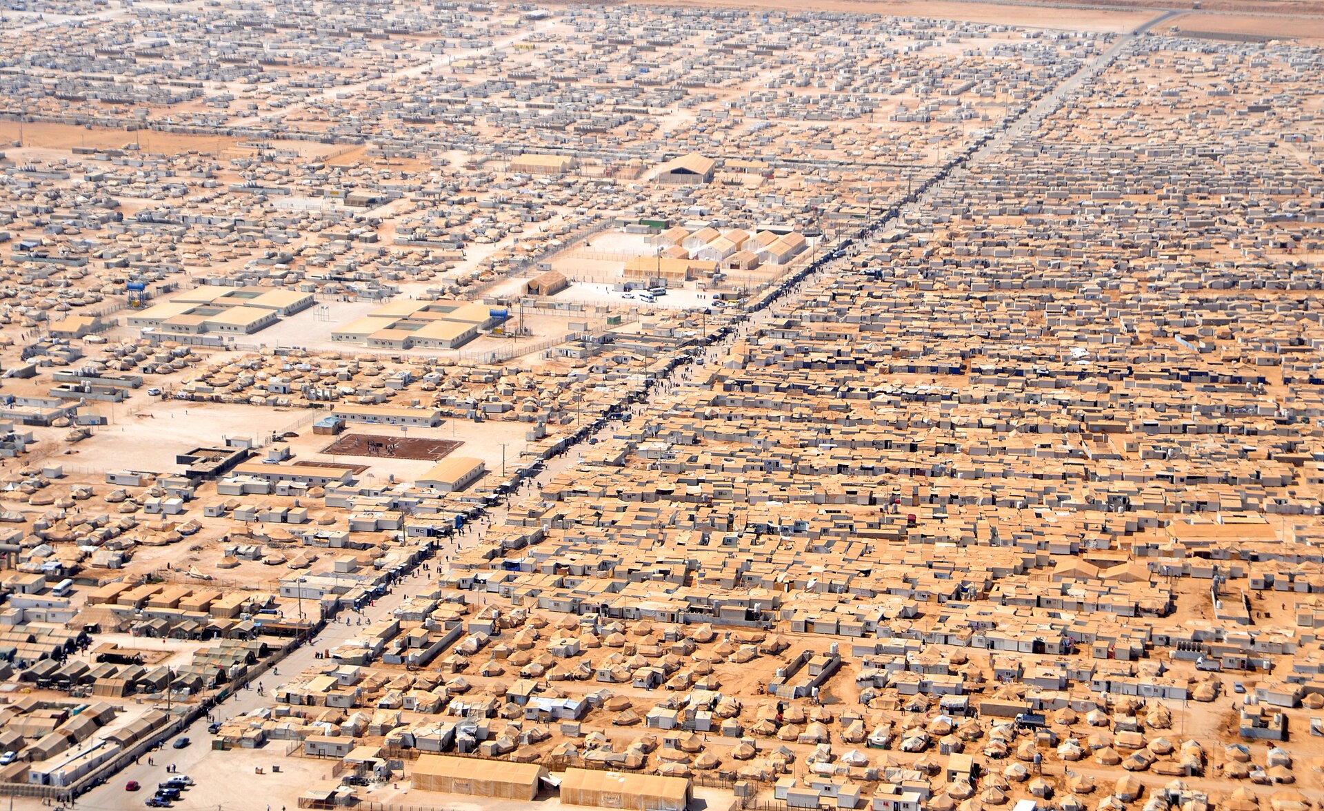 An aerial view of the Zaatari camp, home to tens of thousands of Syrian refugees who fled the war across the border. Jordan's welcome of successive waves of refugees has reshaped its society and strained its limited resources.