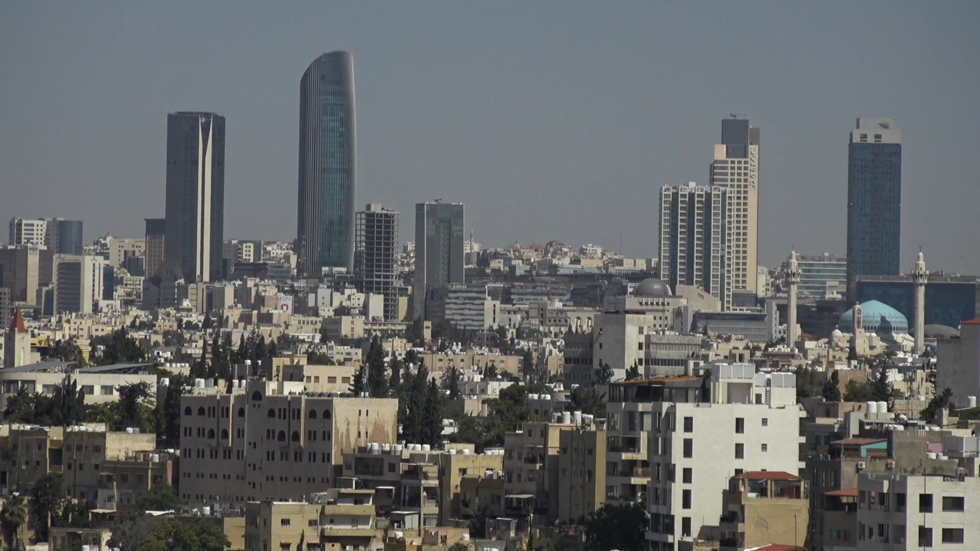 The modern district of Abdali in Amman, the capital and largest city of Jordan. Built across a series of hills, Amman has grown quickly into a regional hub, its old quarters now ringed by gleaming new towers.