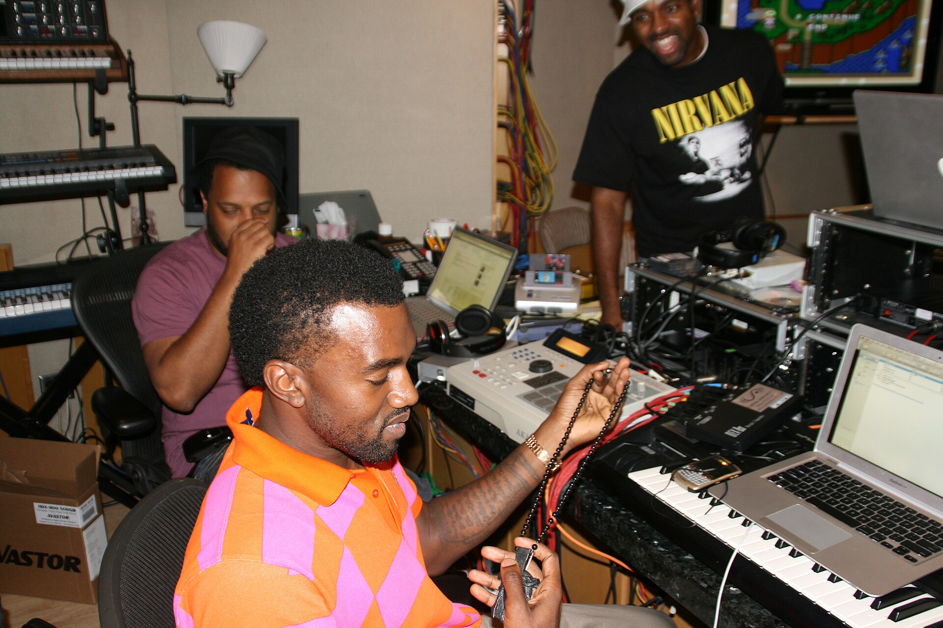 West, center, working on *808s & Heartbreak* with producer No I.D., left, in 2008.