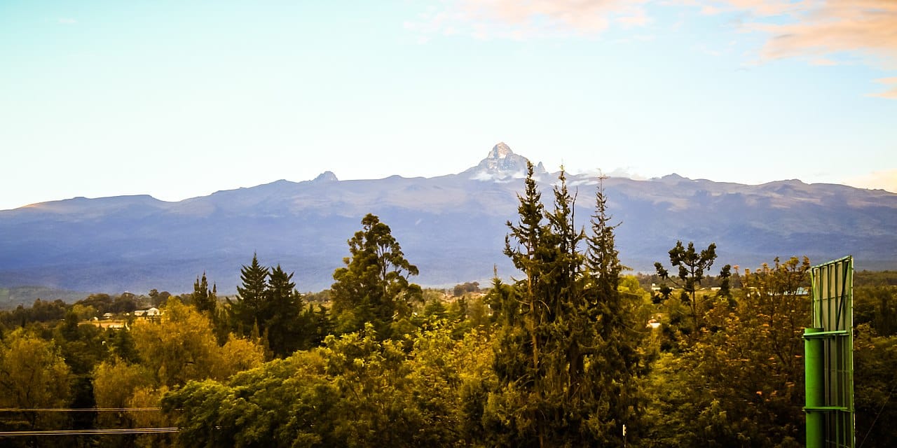 Mount Kenya, the snow-capped, equatorial peak that gives the country its name. At over 5,000 metres it is the second highest mountain in Africa, and its slopes feed the fertile highlands at the heart of the nation.