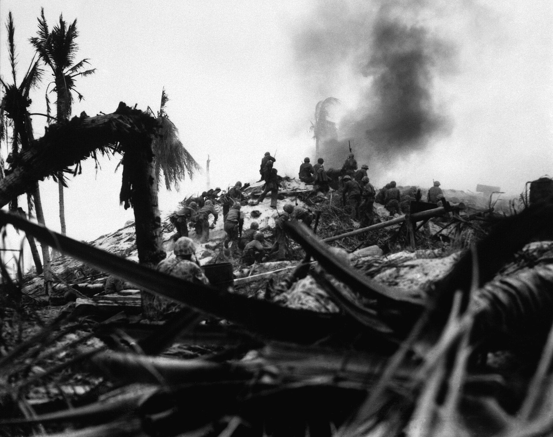 American forces assault a Japanese position during the Battle of Tarawa in 1943, one of the bloodiest of the Pacific war. Credit: Unknown (Public domain).