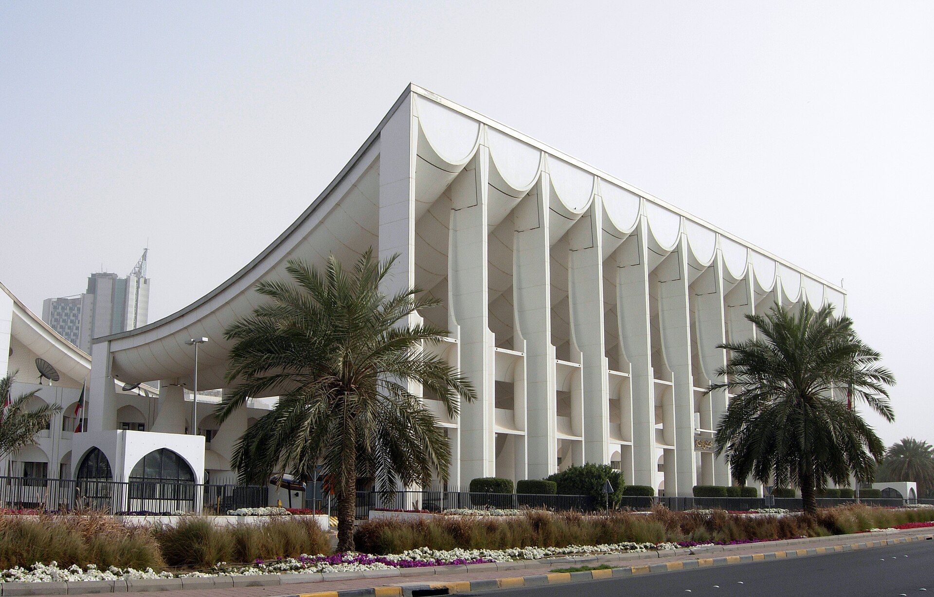 The National Assembly building in Kuwait City, designed by the Danish architect Jørn Utzon with a sweeping roof evoking a Bedouin tent. Home to Kuwait's elected parliament, it symbolises a political tradition unusual in the Gulf, though the assembly was suspended in 2024.