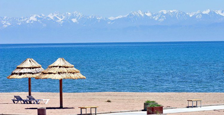 The shore of Issyk-Kul, one of the largest and deepest mountain lakes on Earth. Set high in the Tian Shan, its slightly salty water never freezes, and its beaches have long drawn holidaymakers.