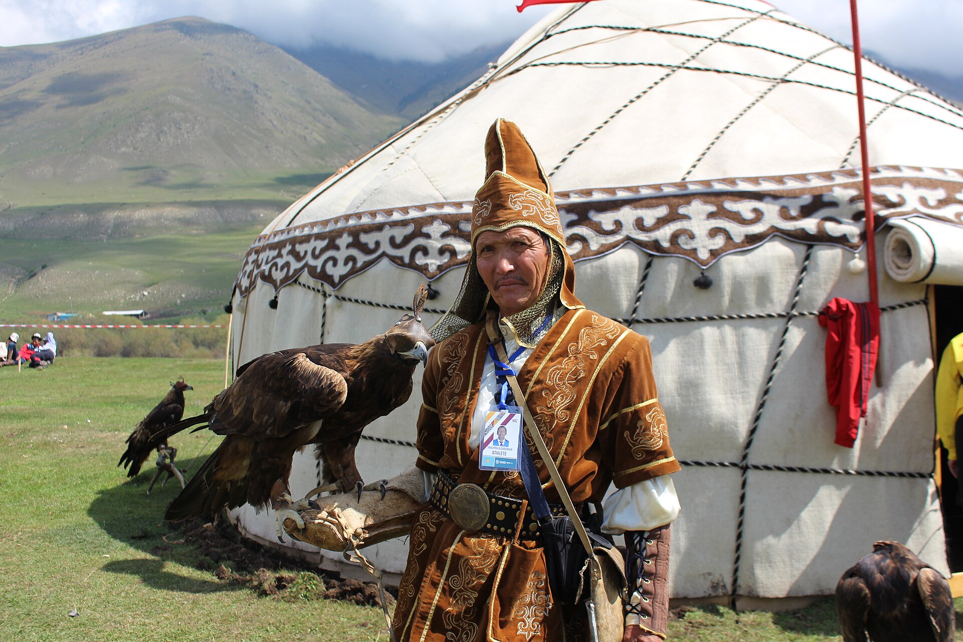 A competitor with a hunting falcon at the World Nomad Games, a festival Kyrgyzstan founded to celebrate the sports and skills of the steppe peoples. Events range from horseback games to eagle hunting and wrestling.