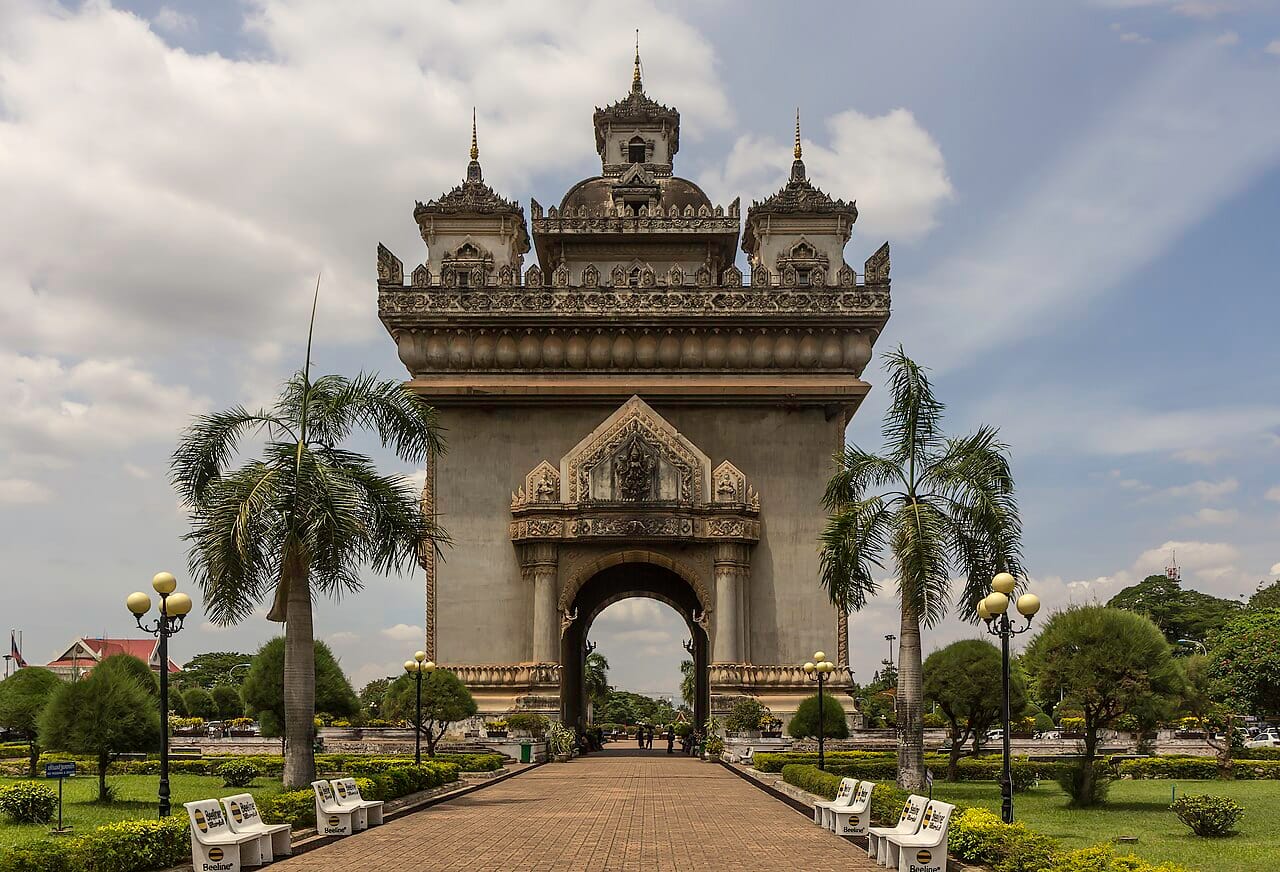 The Patuxai monument in Vientiane, the capital of Laos, built in the mid-twentieth century and echoing a triumphal arch. It stands at the heart of the country's largest city, on the plain beside the Mekong.