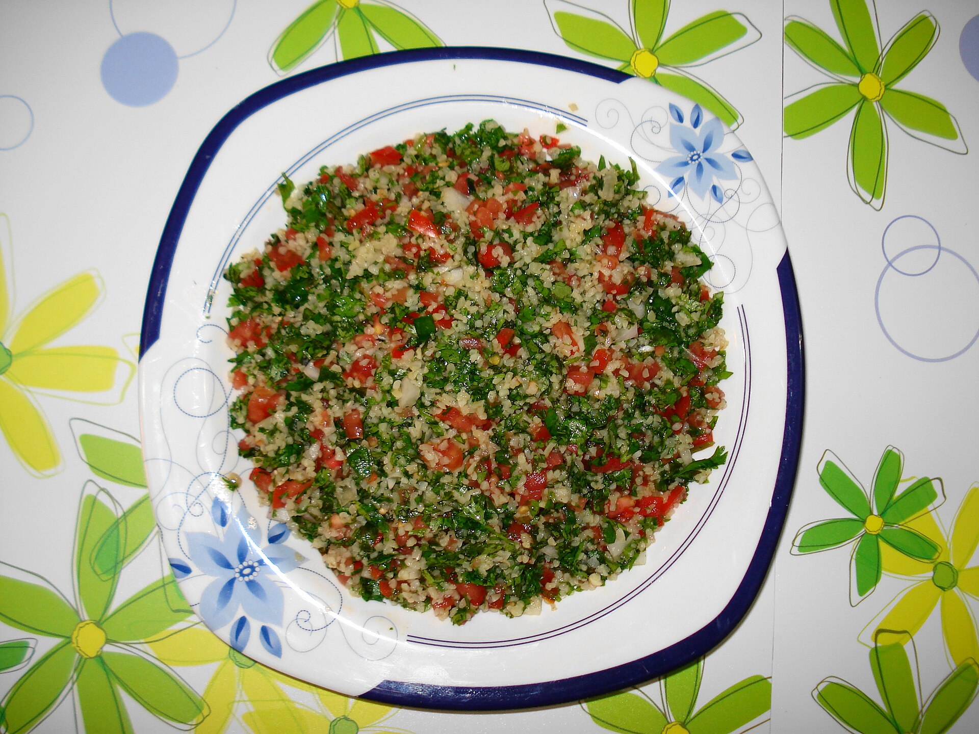 Tabbouleh, the fresh salad of chopped parsley, tomato, bulgur, and mint dressed with lemon and olive oil. A staple of the Lebanese mezze table, it is one of the country's best-known dishes around the world.
