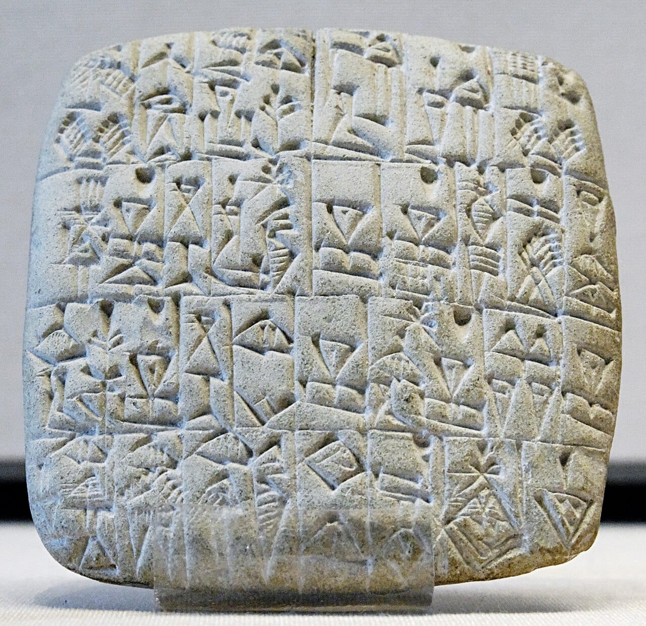 A cuneiform bill of sale. Writing began as an administrative technology, and for millennia reading was a specialist occupation rather than a general skill.