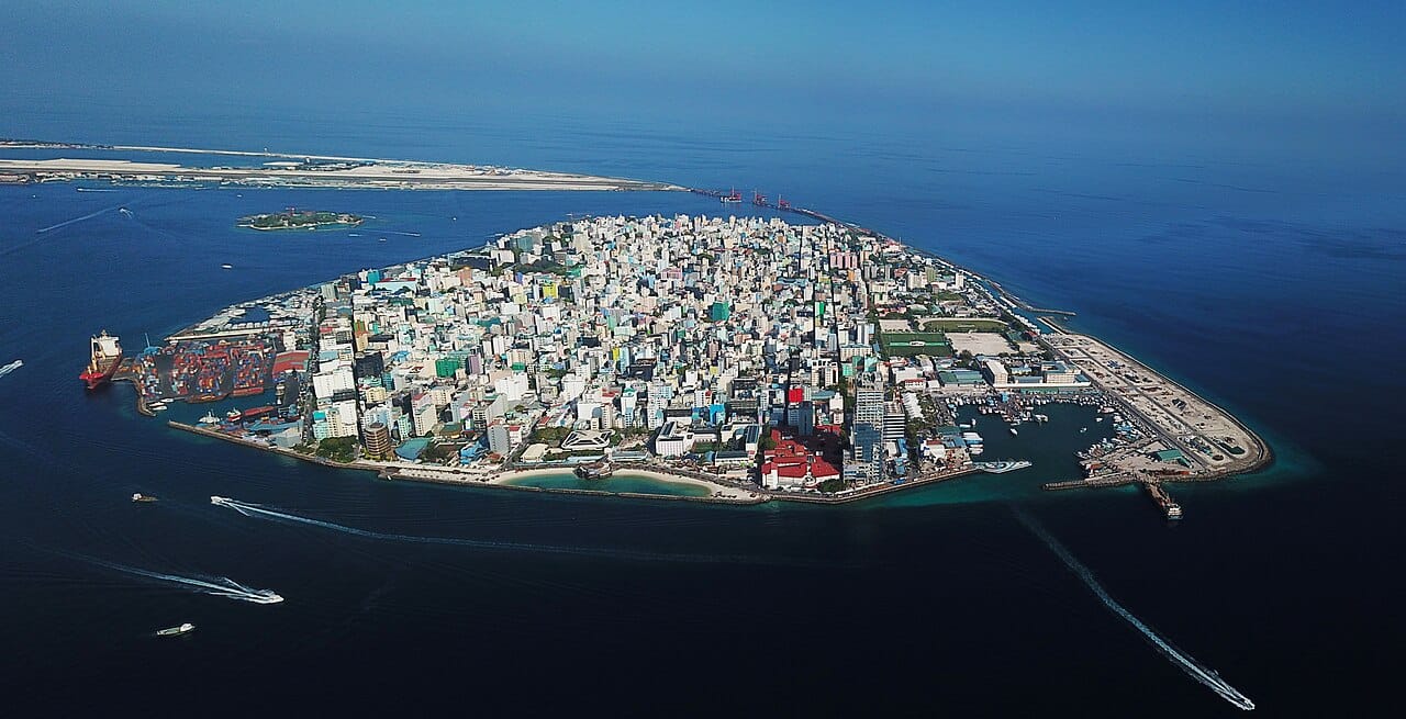 Malé, the capital of the Maldives, packed onto a single small island barely above the waves. One of the most densely populated cities in the world, it is home to a large share of the nation's people.