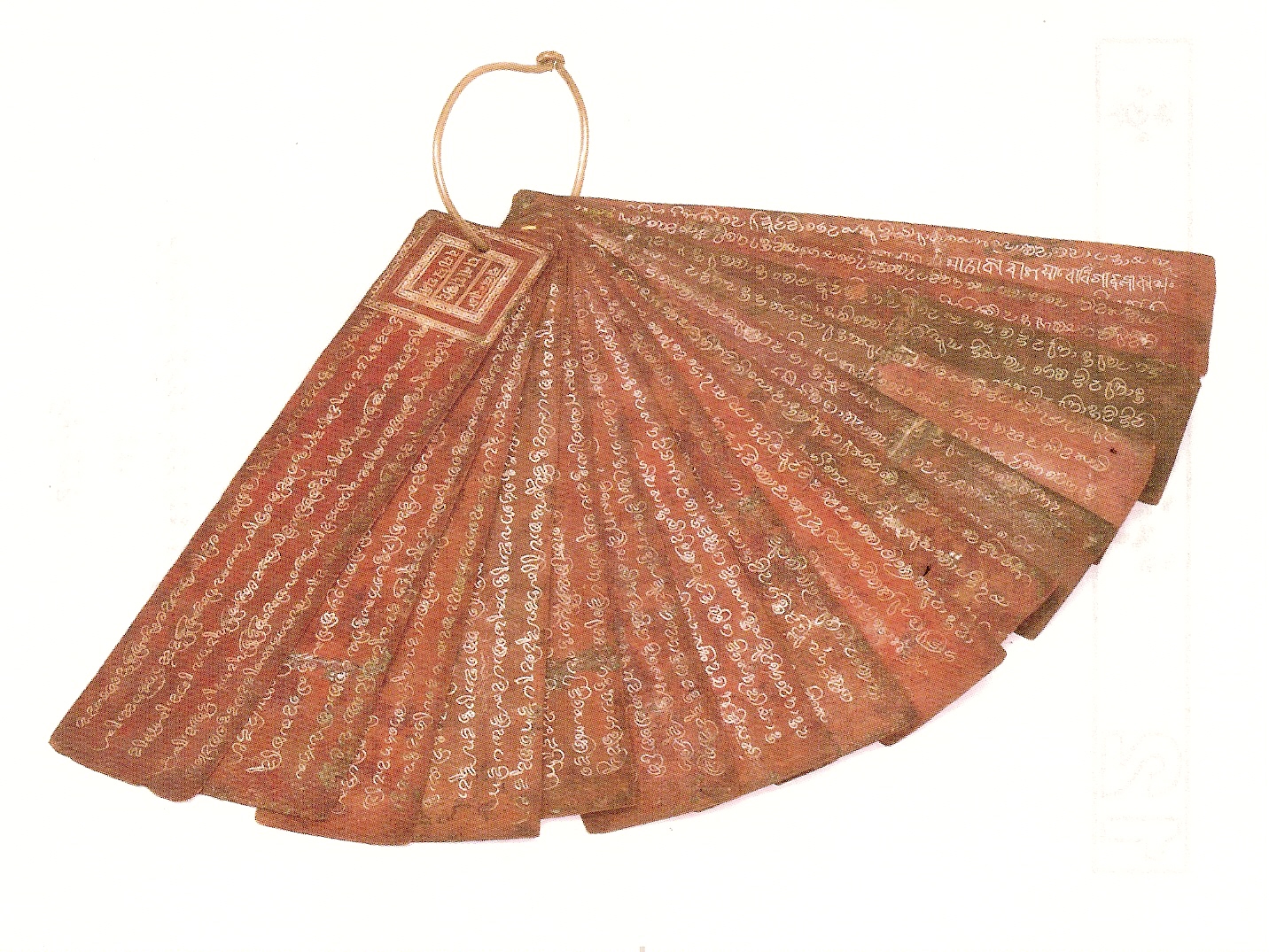 An ancient Maldivian copper-plate book, a relic of the islands' Buddhist era before the conversion to Islam. Credit: Unknown (Public domain).