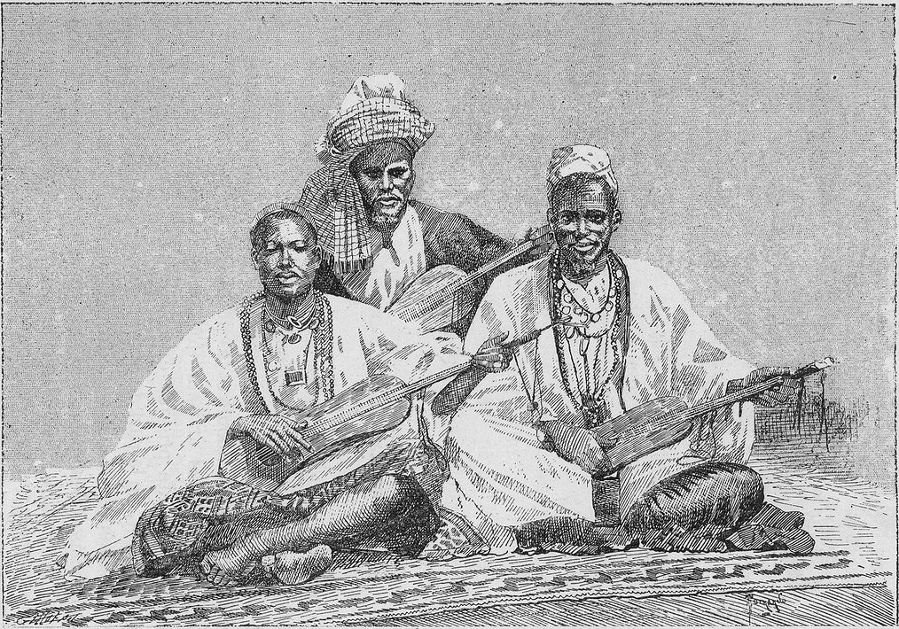 Griots of the Fula people photographed in 1890. These hereditary musicians and oral historians have preserved West Africa's history for centuries and are the root of Mali's celebrated musical tradition.