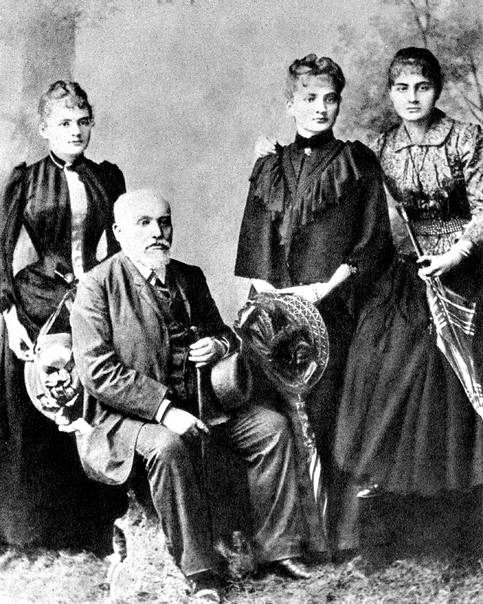 Maria, far left, with her father and sisters in Warsaw in 1890.