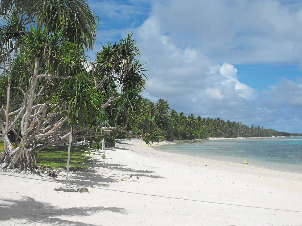 A palm-fringed islet on Majuro Atoll, home to the capital. Like all the Marshalls, it is a thin ribbon of coral only a metre or two above the sea, beautiful but acutely exposed to the rising ocean.