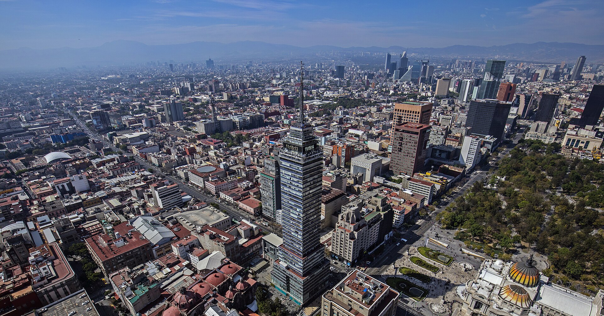 The skyline of Mexico City, built over the ruins of Tenochtitlan. The vast metropolis is the political and economic heart of the country and one of the largest urban areas on the planet.