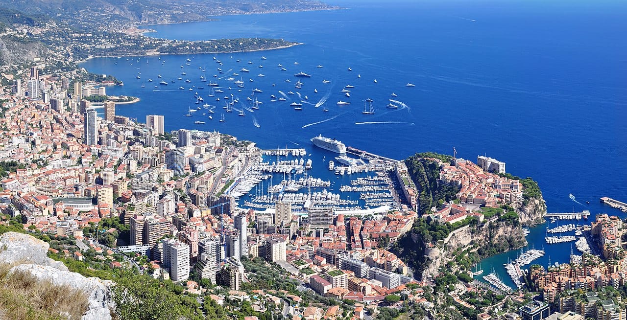 The district of Monte Carlo rising above the Mediterranean. Around 38,000 people are packed into Monaco's tiny territory, making it the most densely populated country on Earth, though native Monégasques are a minority among the wealthy foreign residents drawn to it.