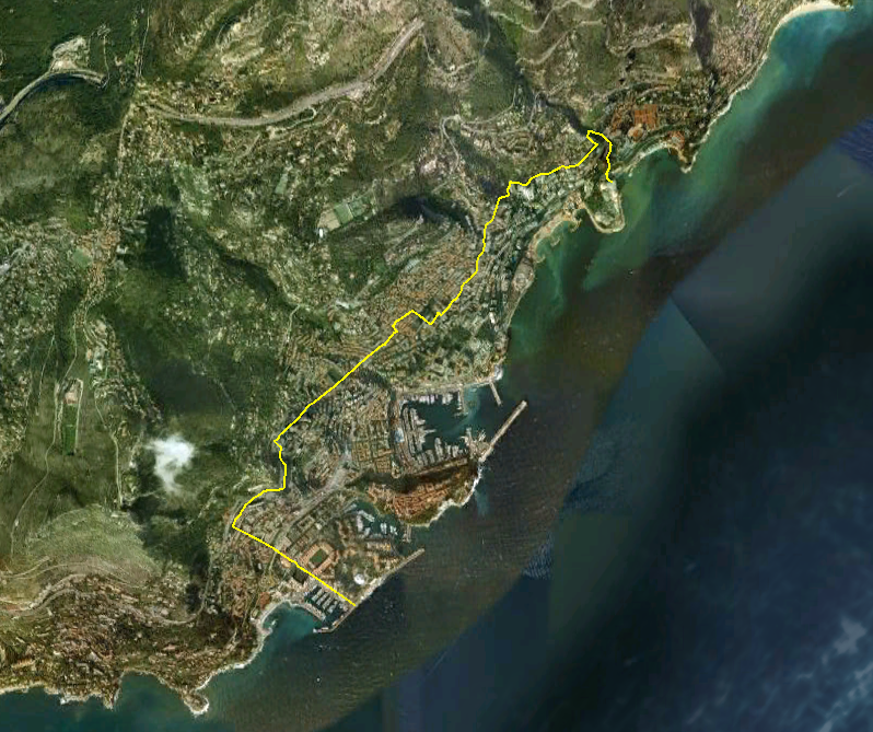 A satellite view of Monaco, hemmed between the Mediterranean and the steep slopes of the Maritime Alps, with the French border marked. With almost no flat ground, the principality is one of the most intensely built-up places on Earth.