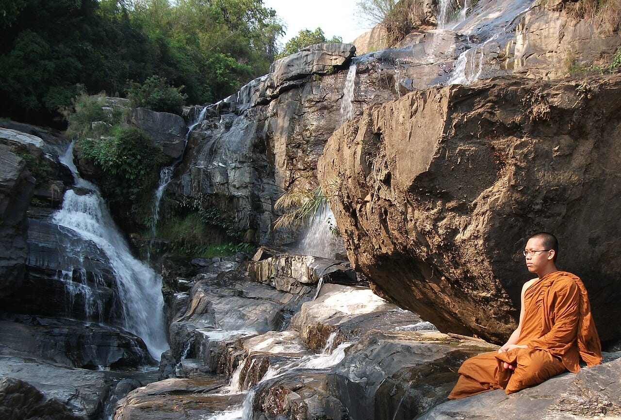 A Buddhist monk. Monastic life across traditions involves withdrawal, discipline and material simplicity, arrived at independently in each.
