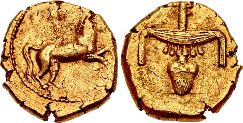 A gold stater. Coinage of standardised weight and purity, stamped by an authority, appeared in Lydia in the seventh century BCE and spread rapidly.