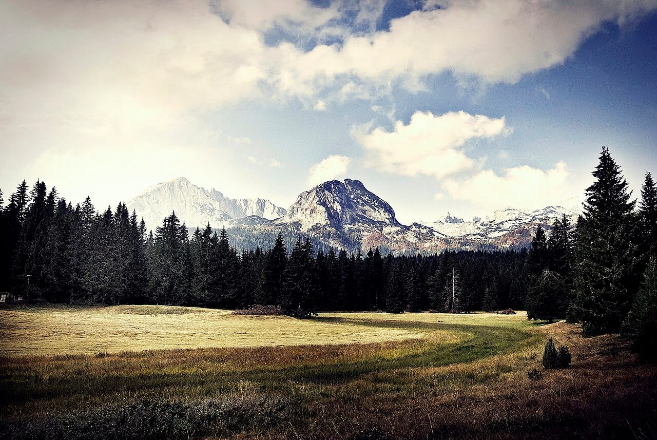 The peaks of Durmitor, a national park in Montenegro's rugged highlands, laced with glacial lakes and cut by the deep canyon of the Tara River. The Black Mountains that give the country its name dominate its dramatic interior.