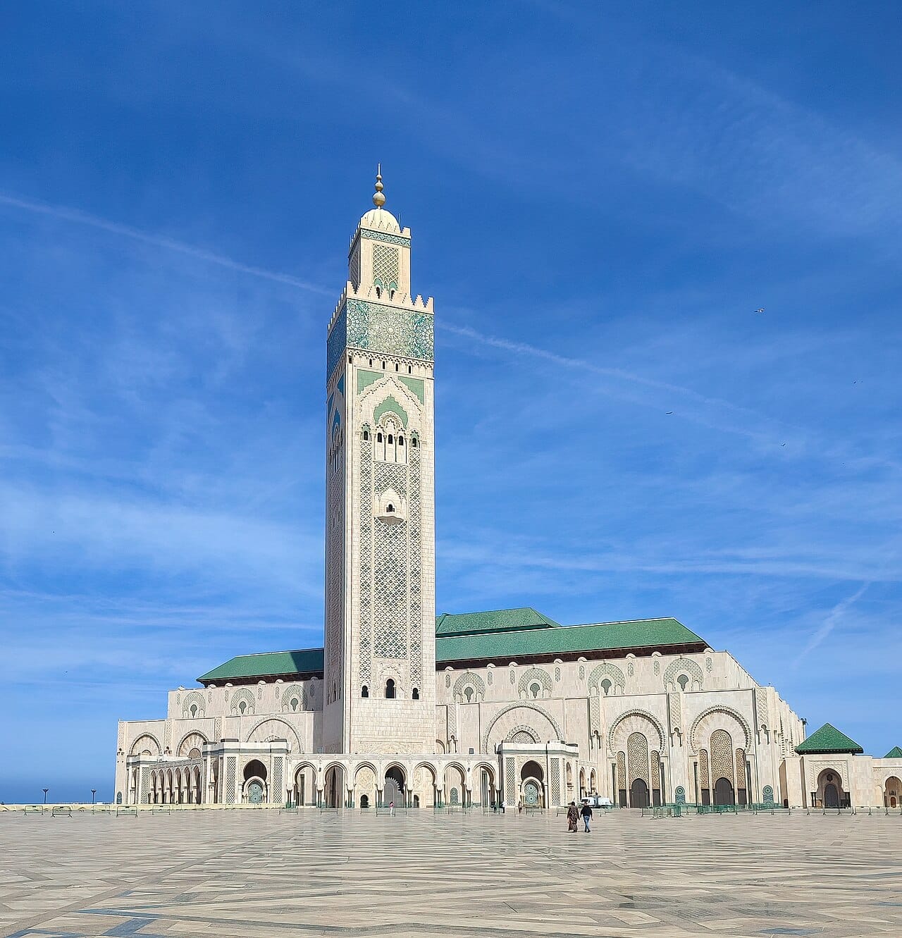 The Hassan II Mosque in Casablanca, one of the largest mosques in the world, with a minaret rising over 200 metres beside the Atlantic. It embodies both the central place of Islam in Moroccan life and the country's modern ambitions.