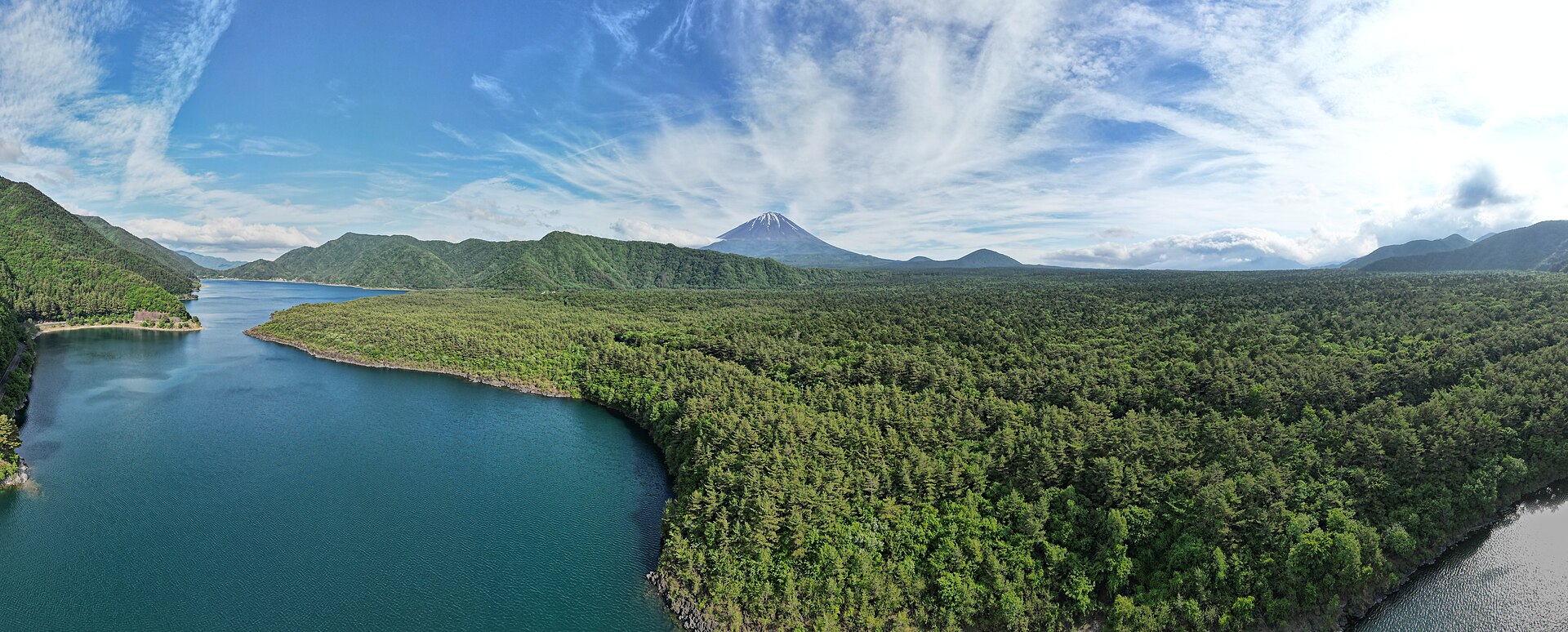 Mount Fuji rising above one of the lakes at its base, its symmetry the result of its volcanic youth. Credit: Bob Tan (CC BY 4.0).