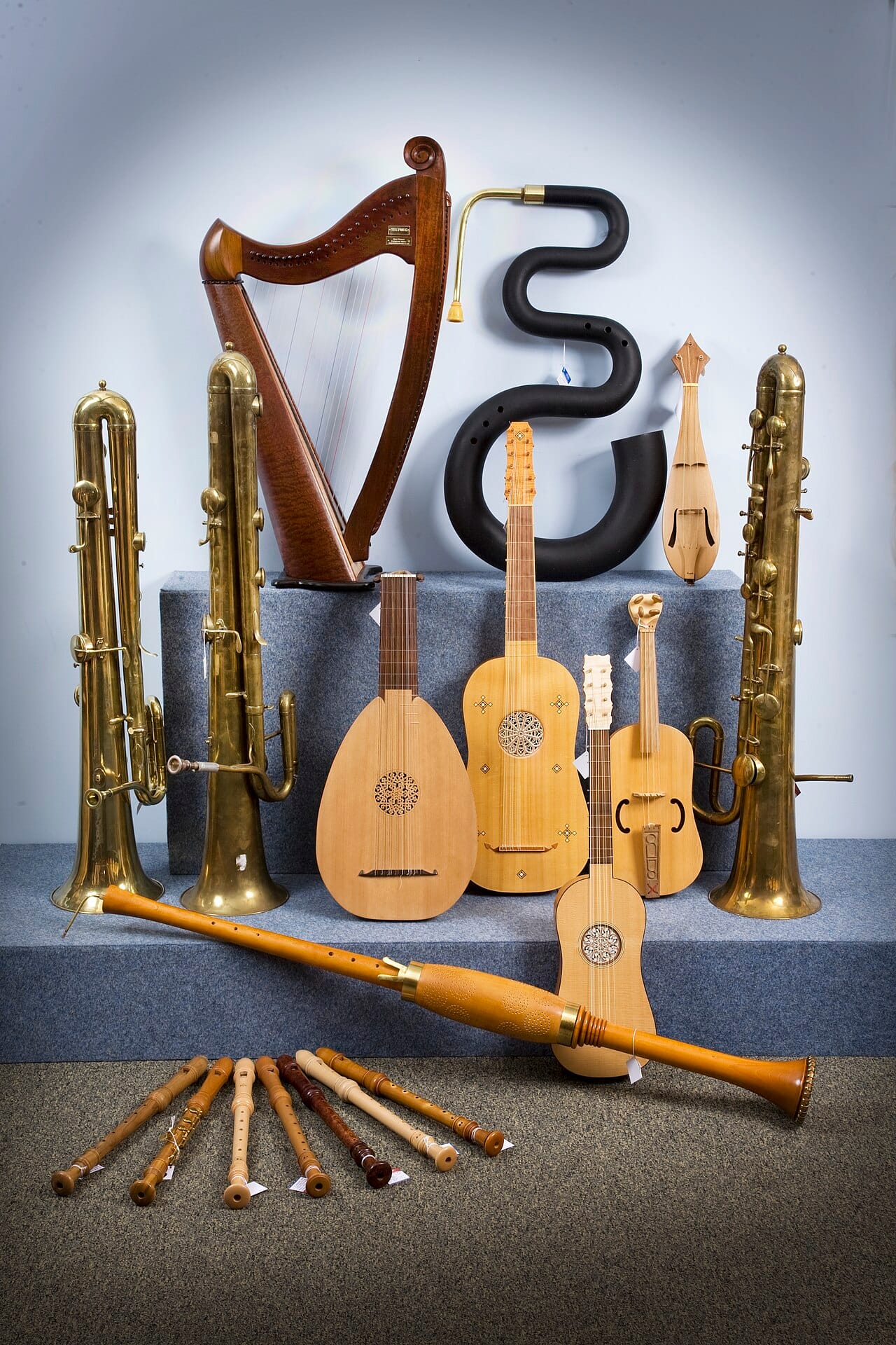 A range of historical instruments. Forms recur across unrelated traditions because the acoustic problems are the same everywhere.