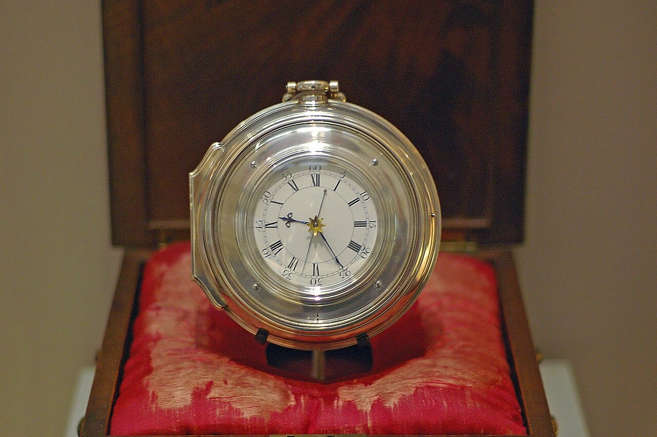 A marine chronometer. Carrying accurate reference time to sea solved the longitude problem, and doing so required a clock unaffected by motion, temperature and humidity.
