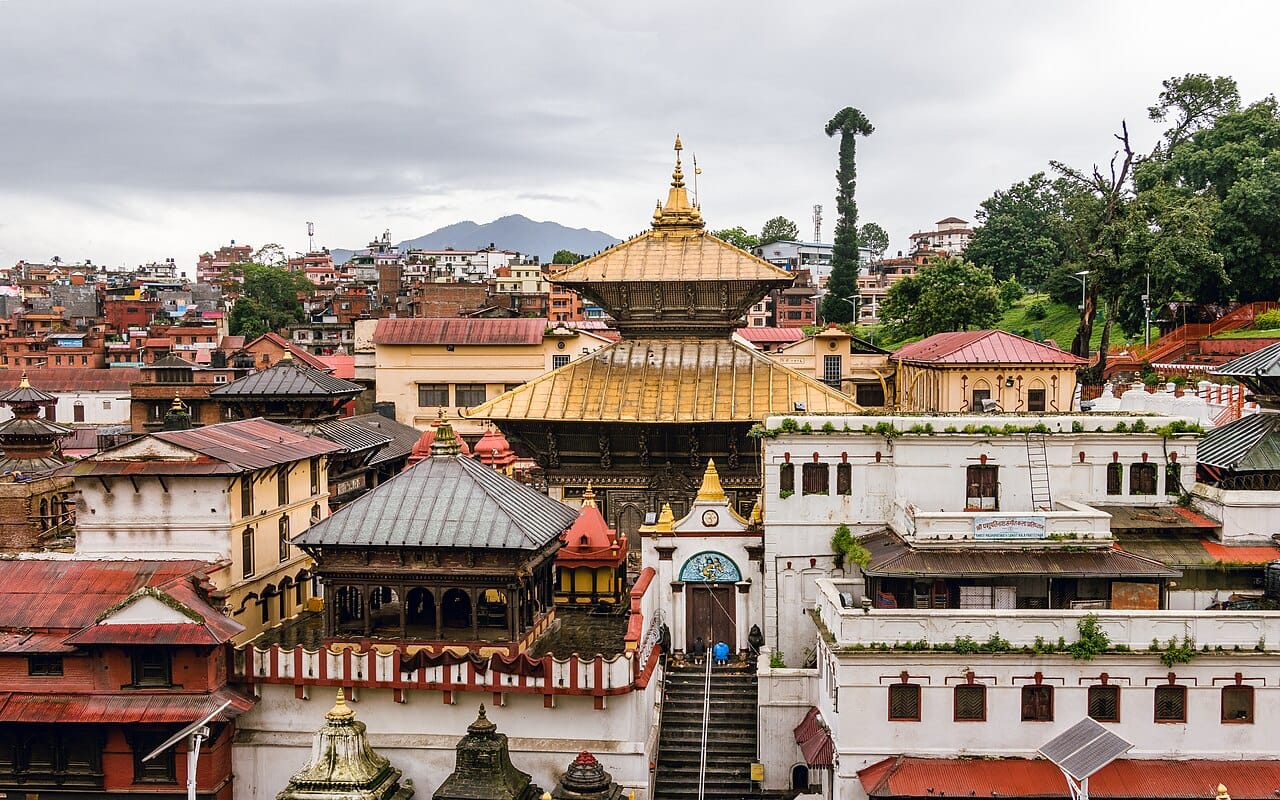 The temple of Pashupatinath on the banks of the Bagmati river in Kathmandu, one of the holiest sites in the Hindu world and dedicated to Shiva. It is a place of pilgrimage and of open-air cremation on the river ghats.