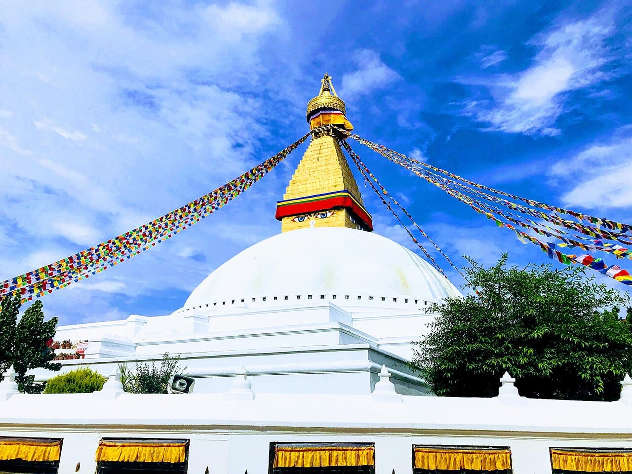 The great stupa of Boudhanath in Kathmandu, one of the largest in the world and a centre of Tibetan Buddhism. Its watchful eyes and streaming prayer flags make it among the most recognisable sights in Nepal.