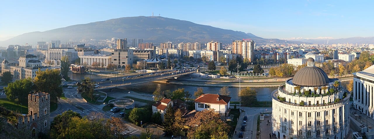 Skopje, the capital and largest city of North Macedonia, home to about a fifth of the country's people. Straddling the Vardar River, it is the political, economic, and cultural heart of the young nation.
