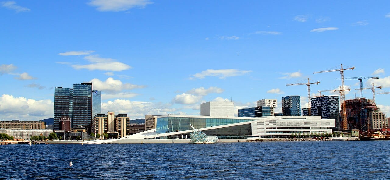 The waterfront of Oslo, the capital and largest city of Norway, at the head of its fjord. A compact, prosperous city of modern architecture set against the water and forested hills, it is home to the government, the monarchy, and much of the nation's cultural life.