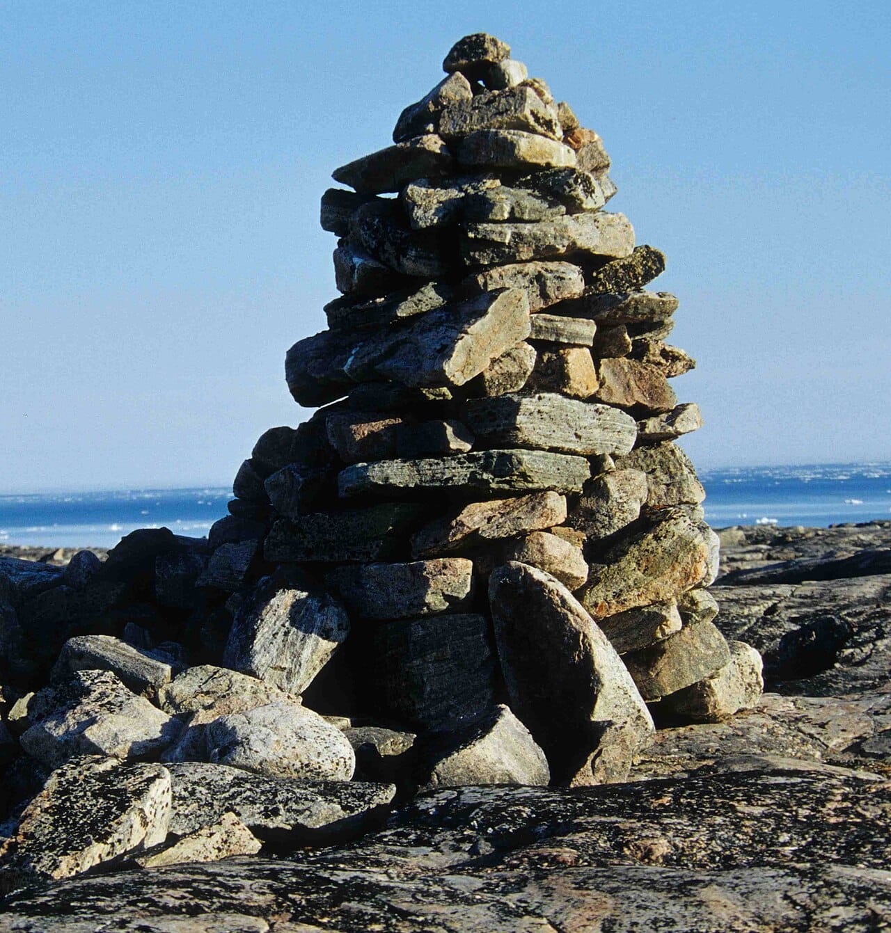 An inuksuk, a figure of stacked stones built by the Inuit to serve as a marker or landmark on the vast, featureless tundra. It has become one of the best-known symbols of the Canadian Arctic.