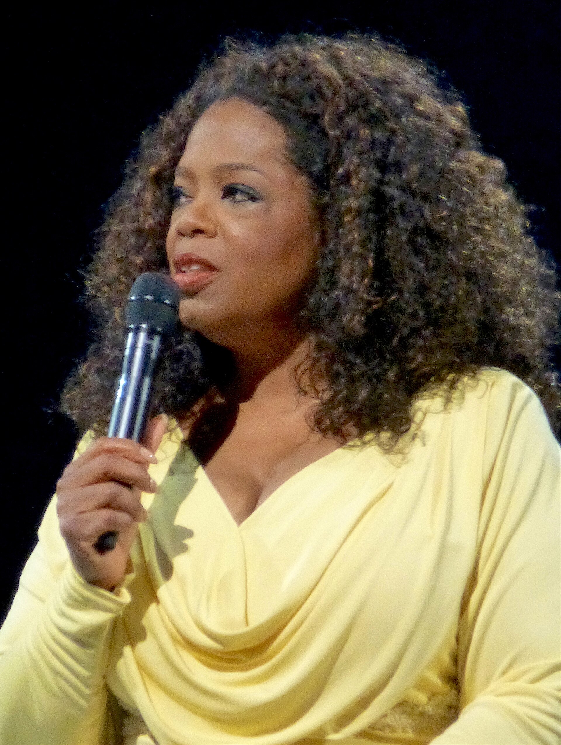 Winfrey on her "The Life You Want" tour in 2014; her bond with audiences defined a media era.