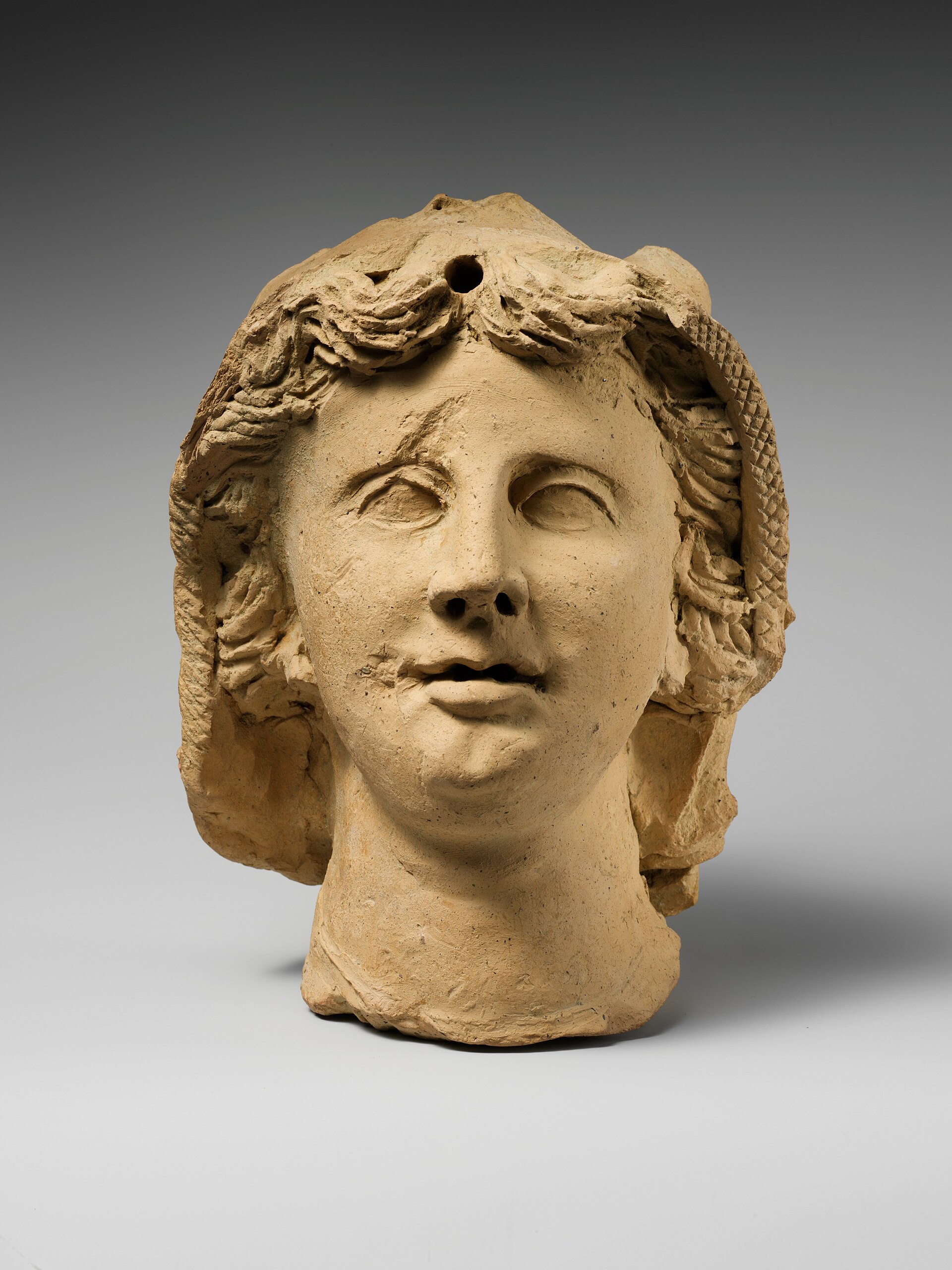 An Etruscan sculpted head, reflecting the artistry of this enigmatic people.