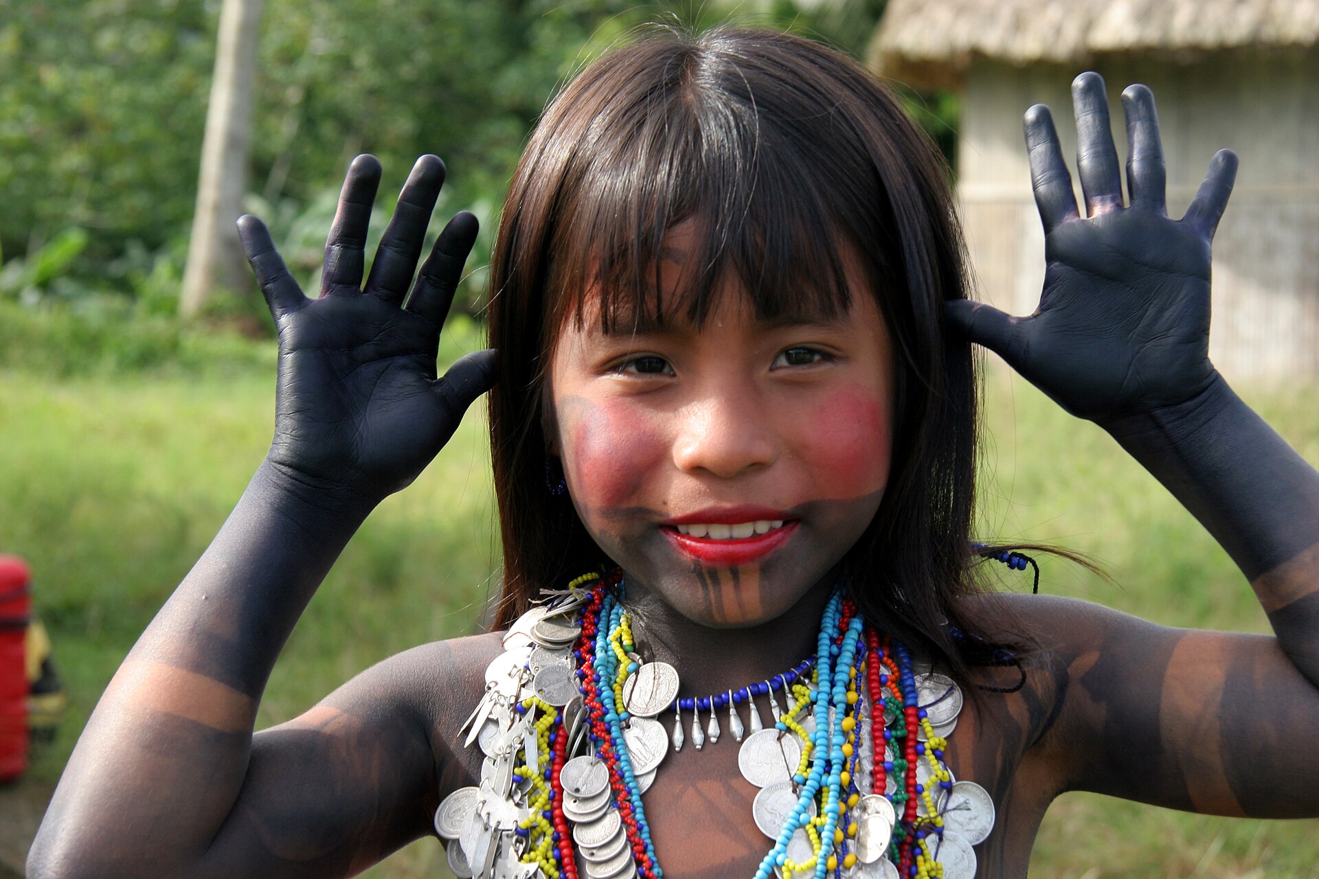 A young Embera girl in traditional dress for a dance. Several indigenous peoples, among them the Embera and the Guna, preserve their cultures and self-governing homelands in Panama, part of the country's rich crossroads heritage.