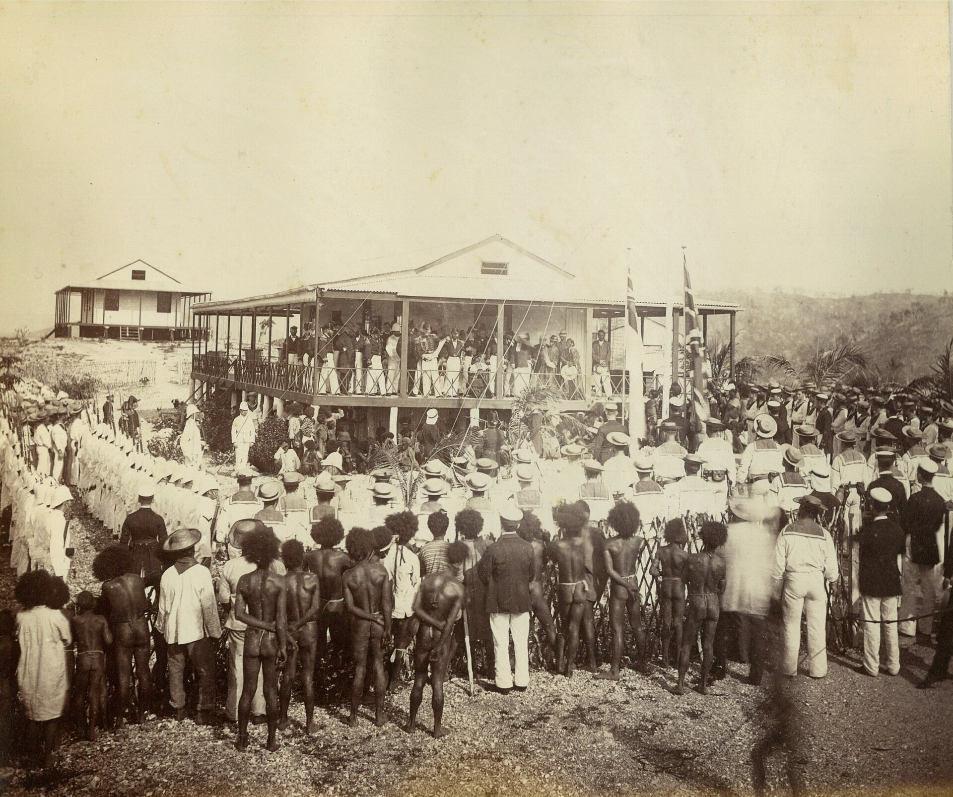 The reading of a proclamation of annexation in New Guinea in the late nineteenth century, as European powers laid claim to the island. Colonial rule came late and was thin over so vast and rugged a land.