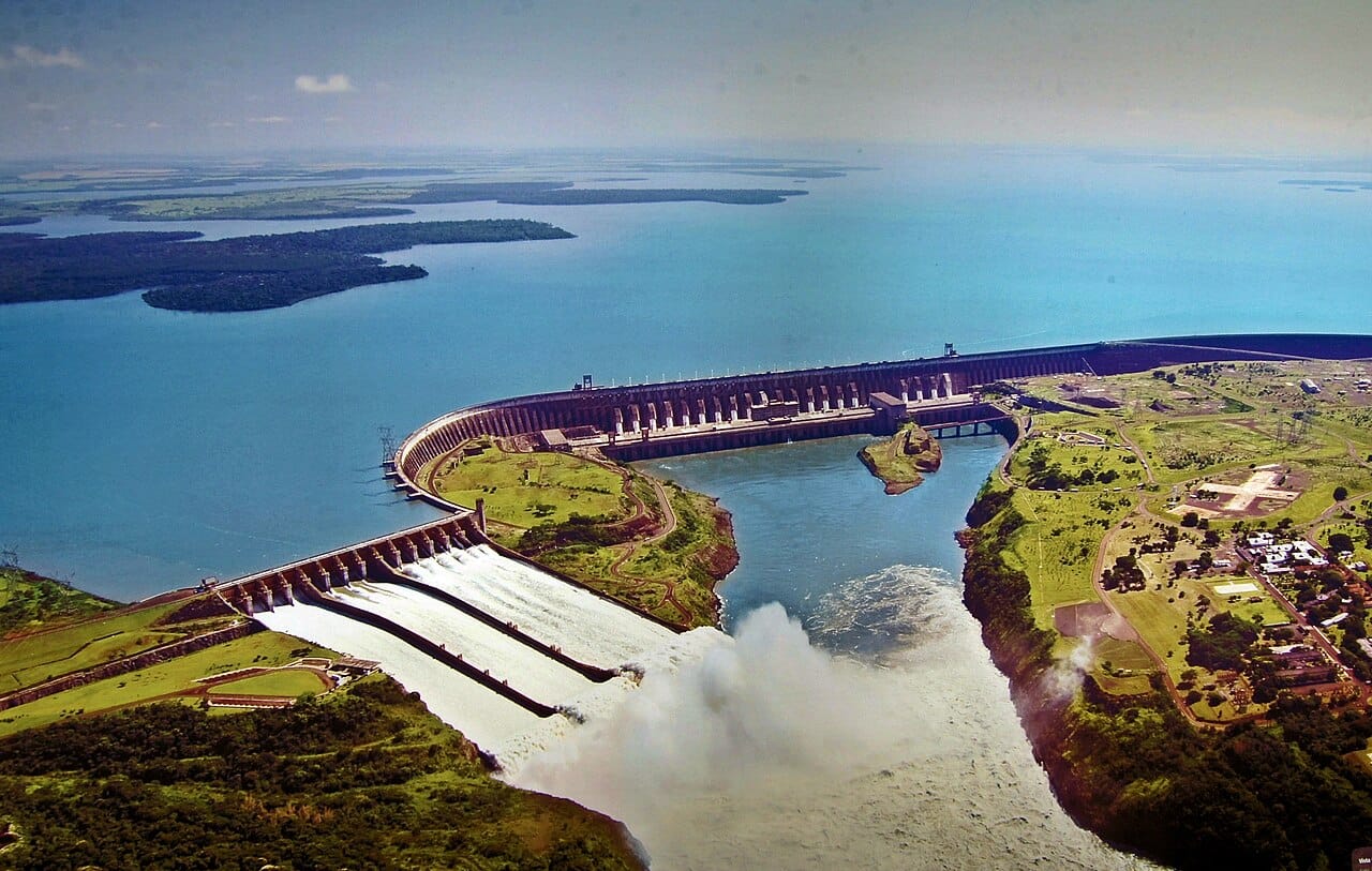 The Itaipu Dam on the Parana River, shared by Paraguay and Brazil and long the largest hydroelectric plant in the world by output. It makes tiny Paraguay one of the biggest exporters of clean electricity on Earth.