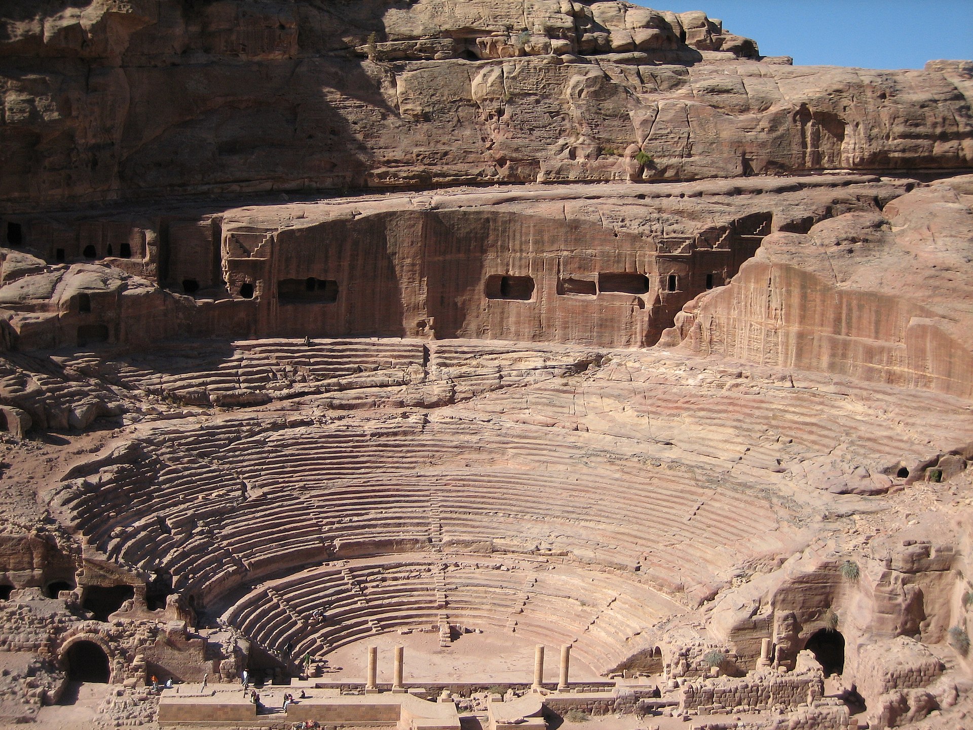 One of the many carved facades cut into the sandstone cliffs of Petra. Credit: Douglas Perkins (CC BY 2.0).