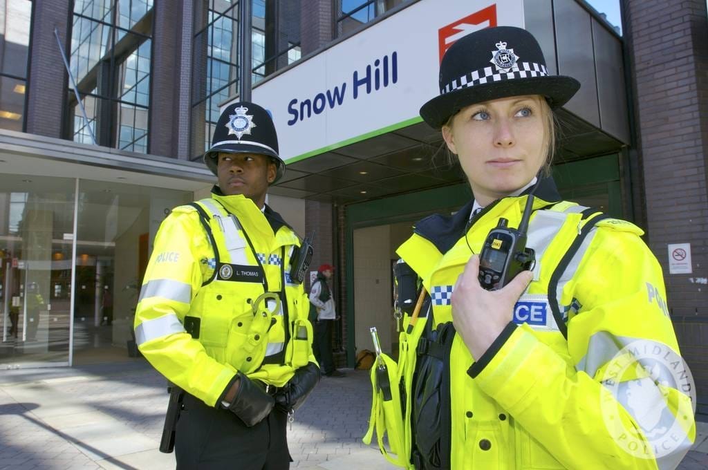 Officers patrolling public transport. Visible patrol is the most familiar police activity, and the evidence on whether general patrol reduces crime is weak.