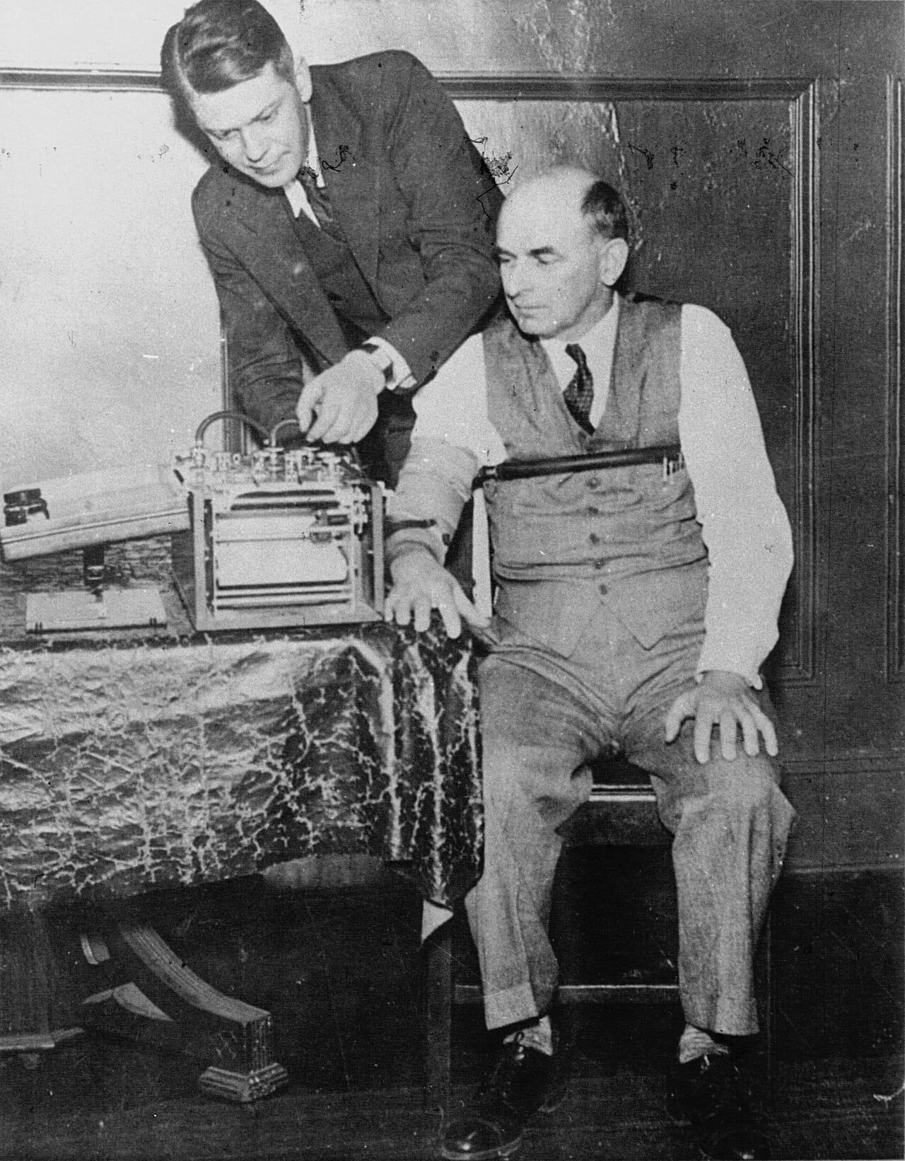 Leonarde Keeler demonstrating his polygraph in 1937. The instrument was promoted from the outset as a scientific device, and the presentation has always been part of how it works.