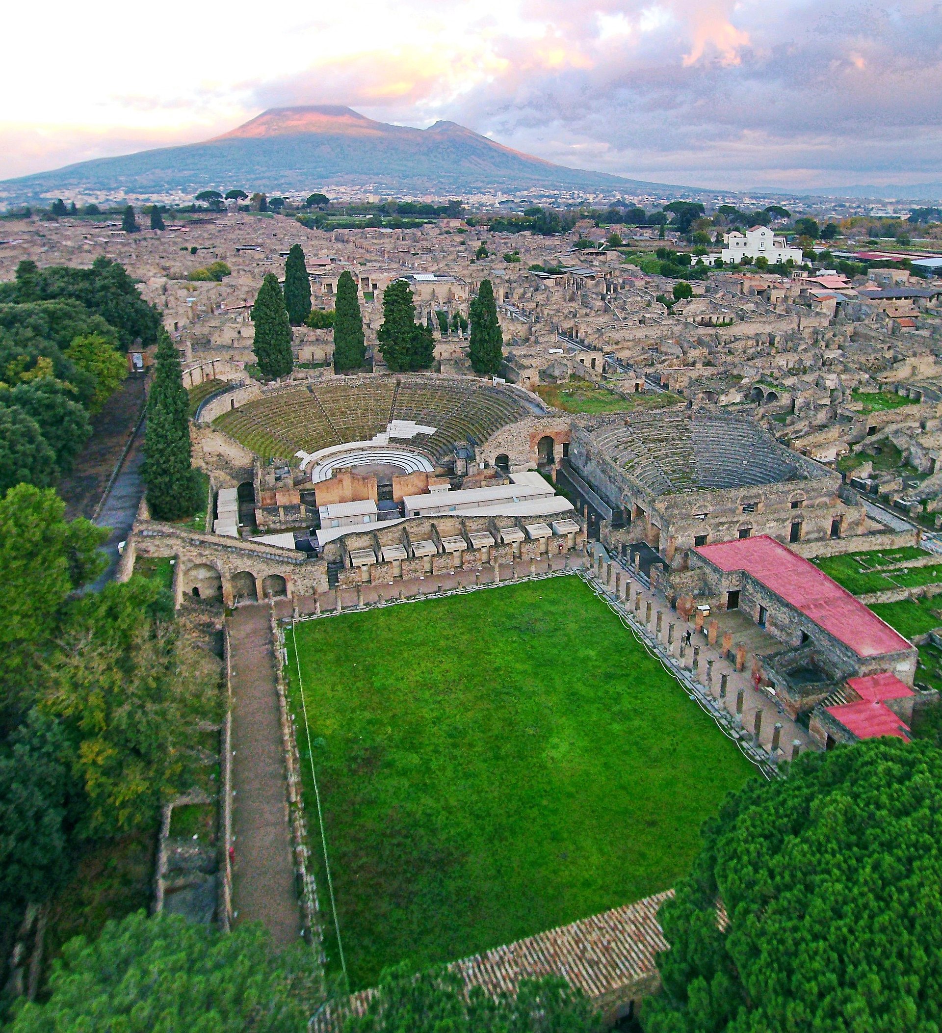 The forum of Pompeii, with Mount Vesuvius rising behind it.
