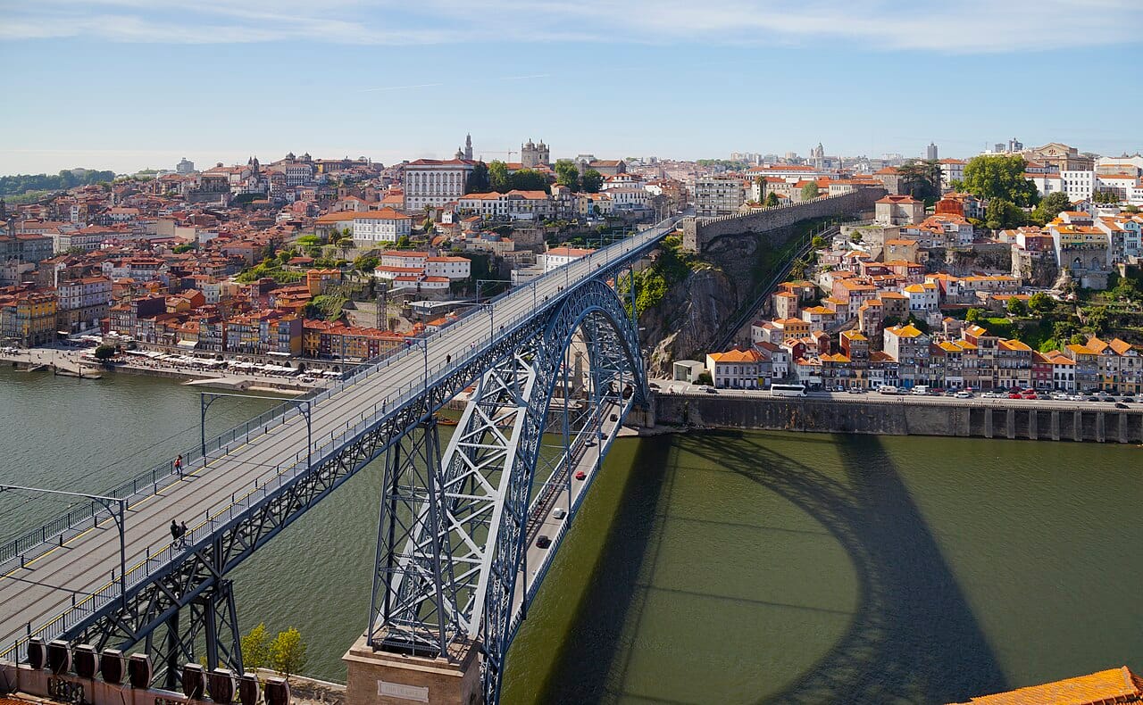 The city of Porto, climbing the steep banks of the Douro river in the north. Portugal's second city gives its name to port wine, aged in the lodges along the river and shipped from here around the world.