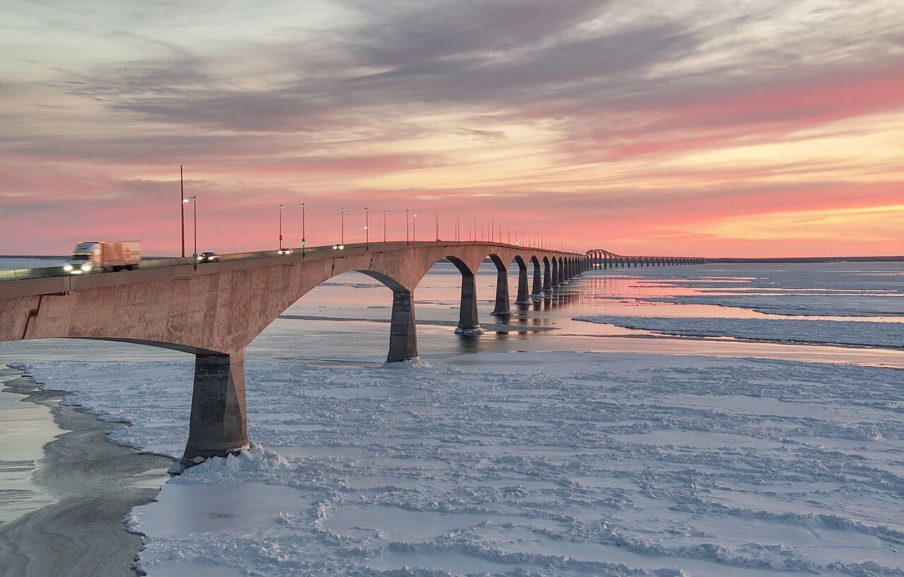 The Confederation Bridge in winter, the thirteen-kilometre span opened in 1997 that links Prince Edward Island to the mainland across the Northumberland Strait. It is one of the longest bridges over ice-covered water in the world.