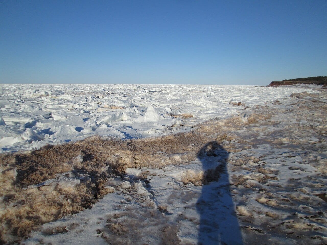 Sea ice filling the Gulf of St Lawrence around Prince Edward Island in winter. The surrounding waters freeze each year, though the island's climate is mild by Canadian standards.