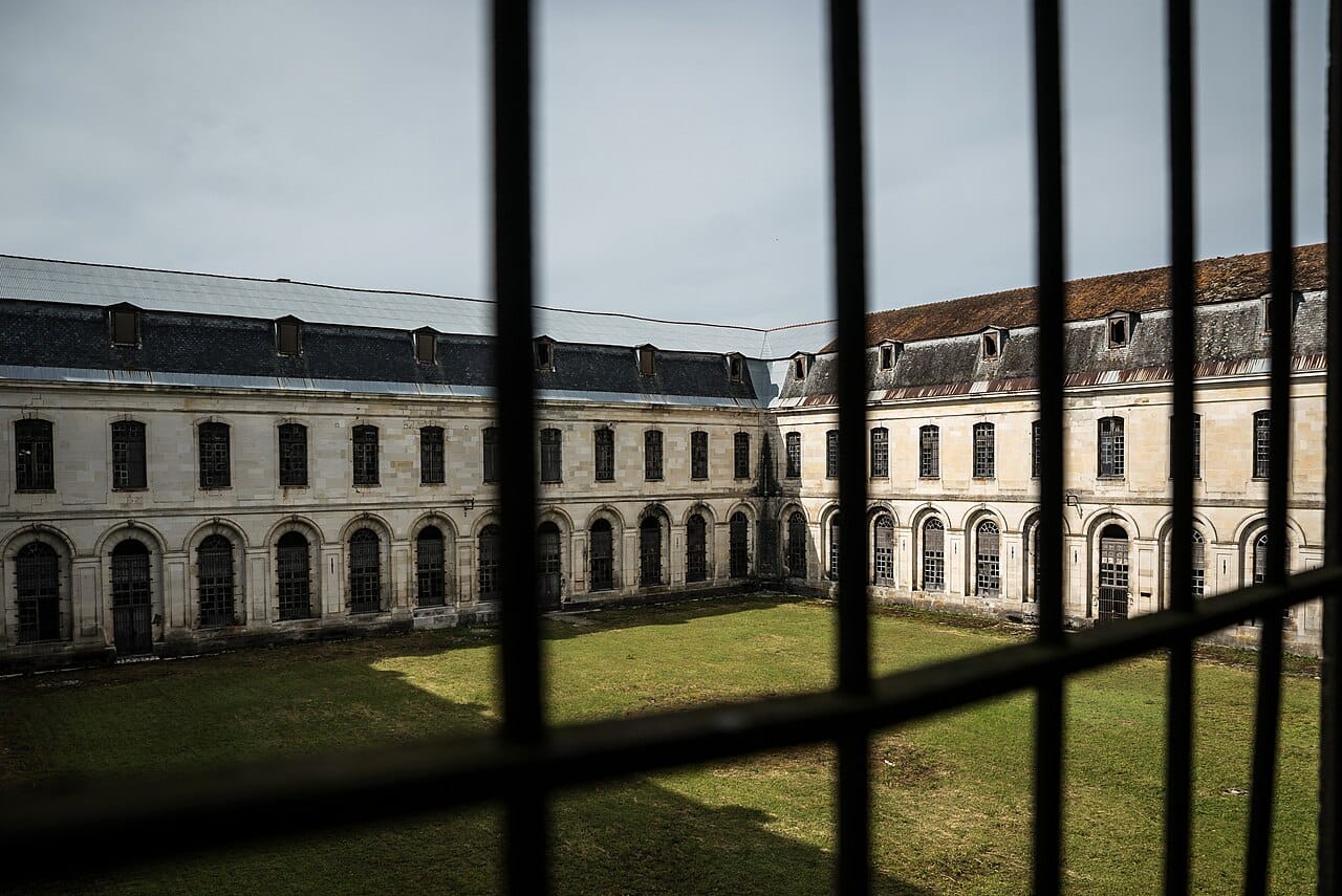 A medieval abbey. Religious institutions used solitary confinement as a means of penitence, which is the origin of the word penitentiary.